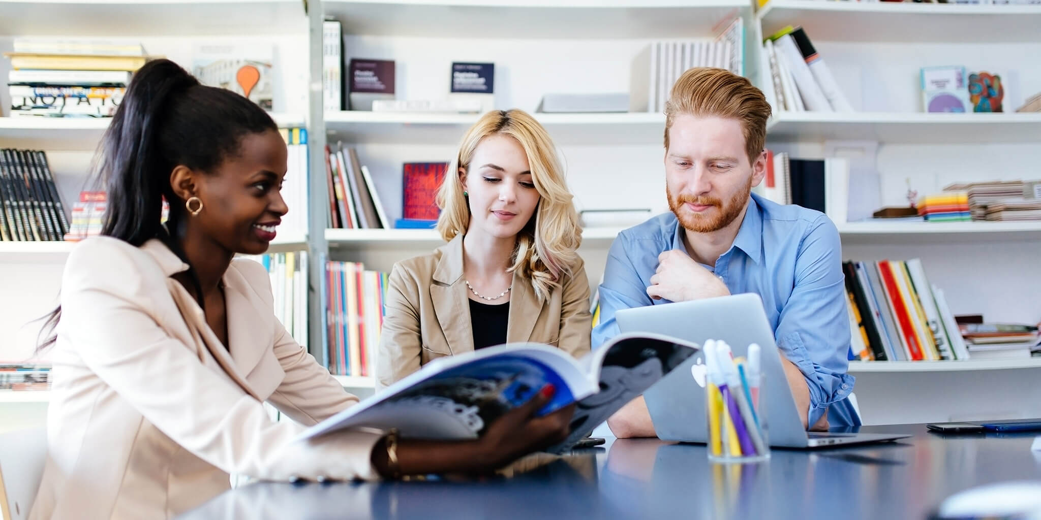 Sales and Marketing Team Reviewing Marketing Materials